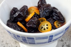 poached prunes and kumquats